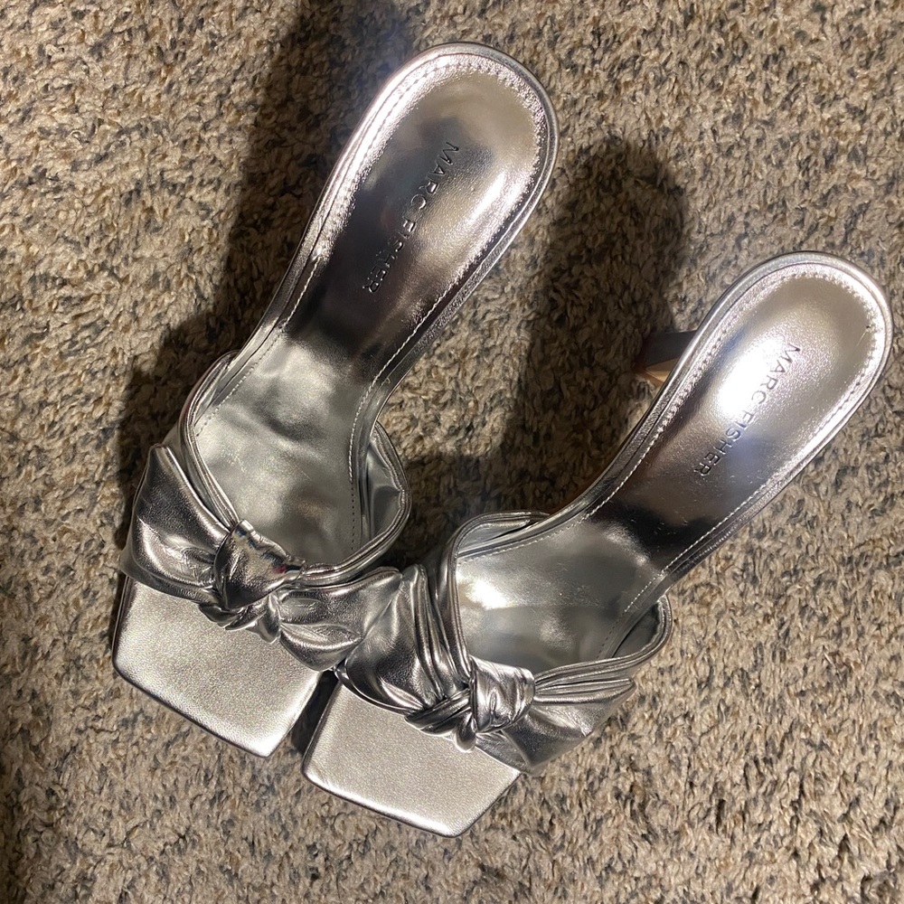 Women’s high heels slip on Mark Fisher shoes.